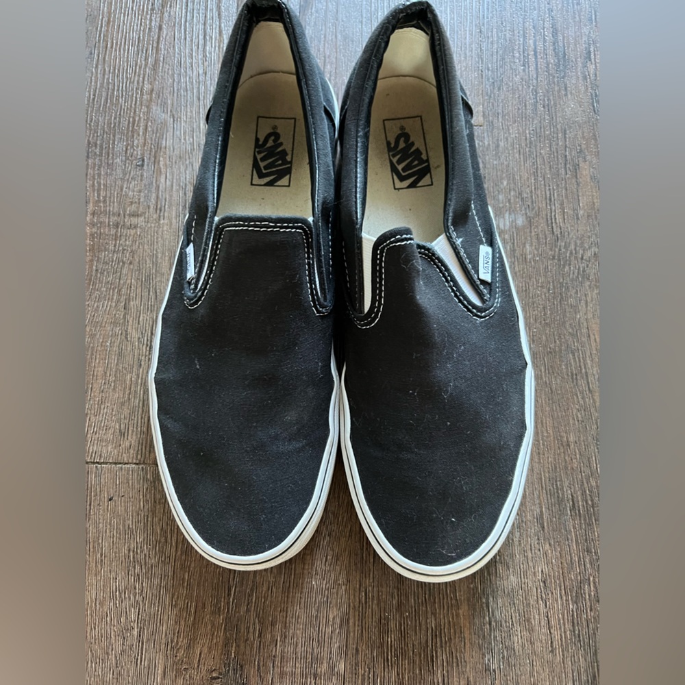 Men’s size 12 Black classic Vans slip ons.